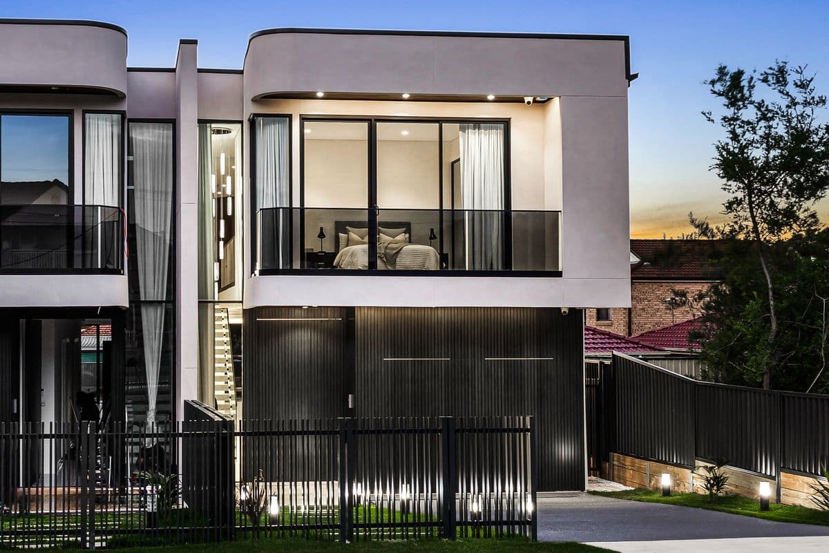 Contemporary dual occupancy with rendered facade and Colorbond roof