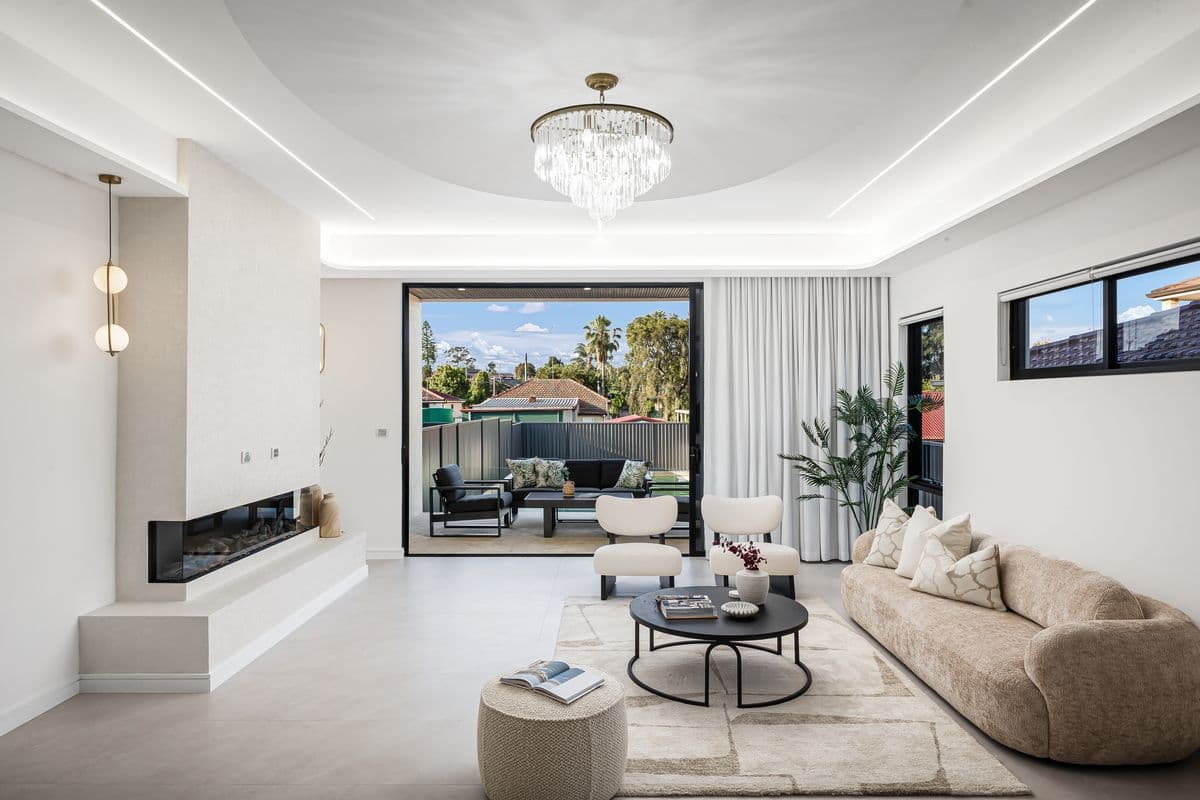 Premium duplex living area with stone benchtops and timber floors