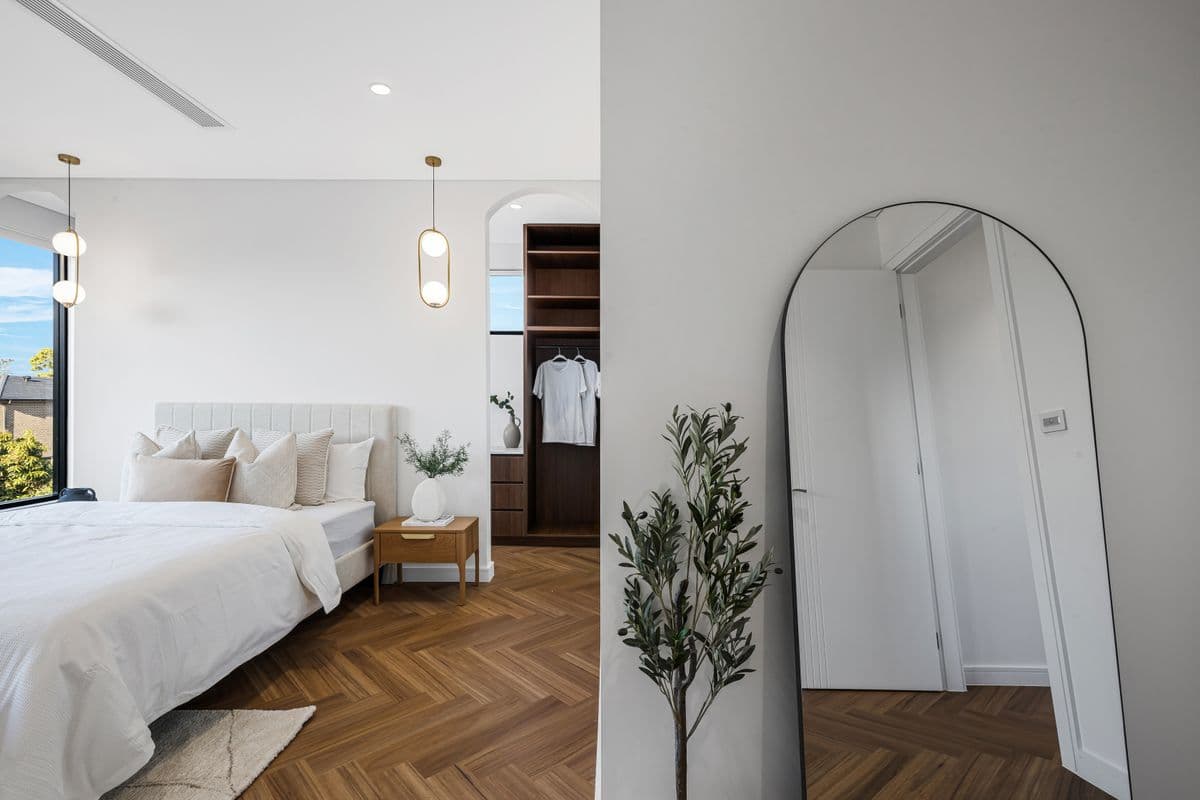 Master bedroom with walk-in robe in Buildana duplex