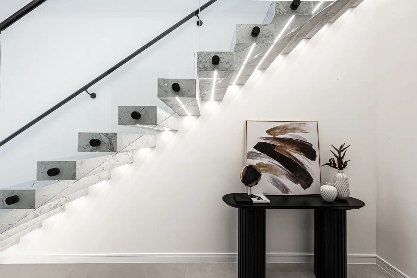 Timber staircase with glass balustrade in a new home