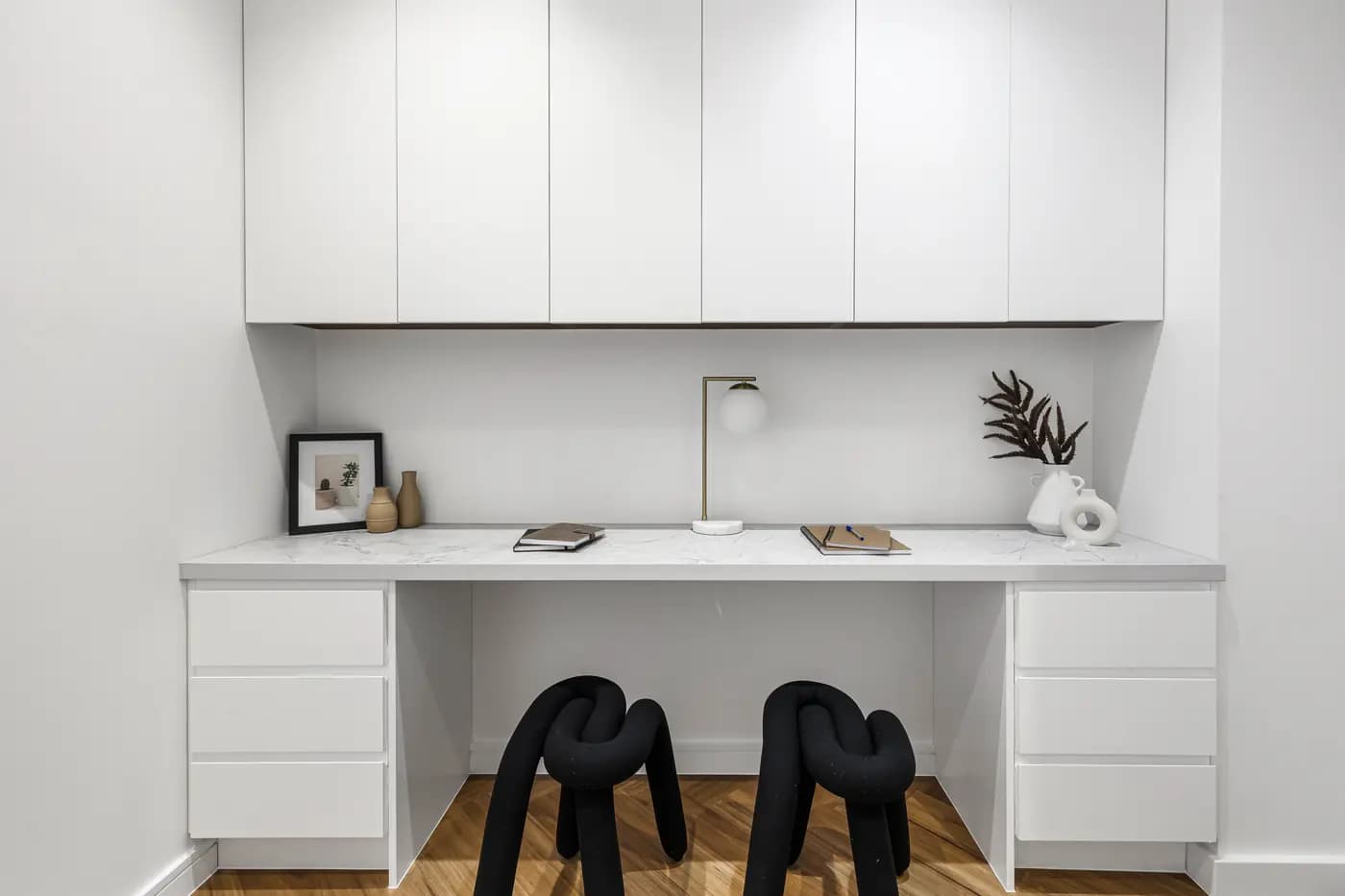 Home study with built-in white desk joinery